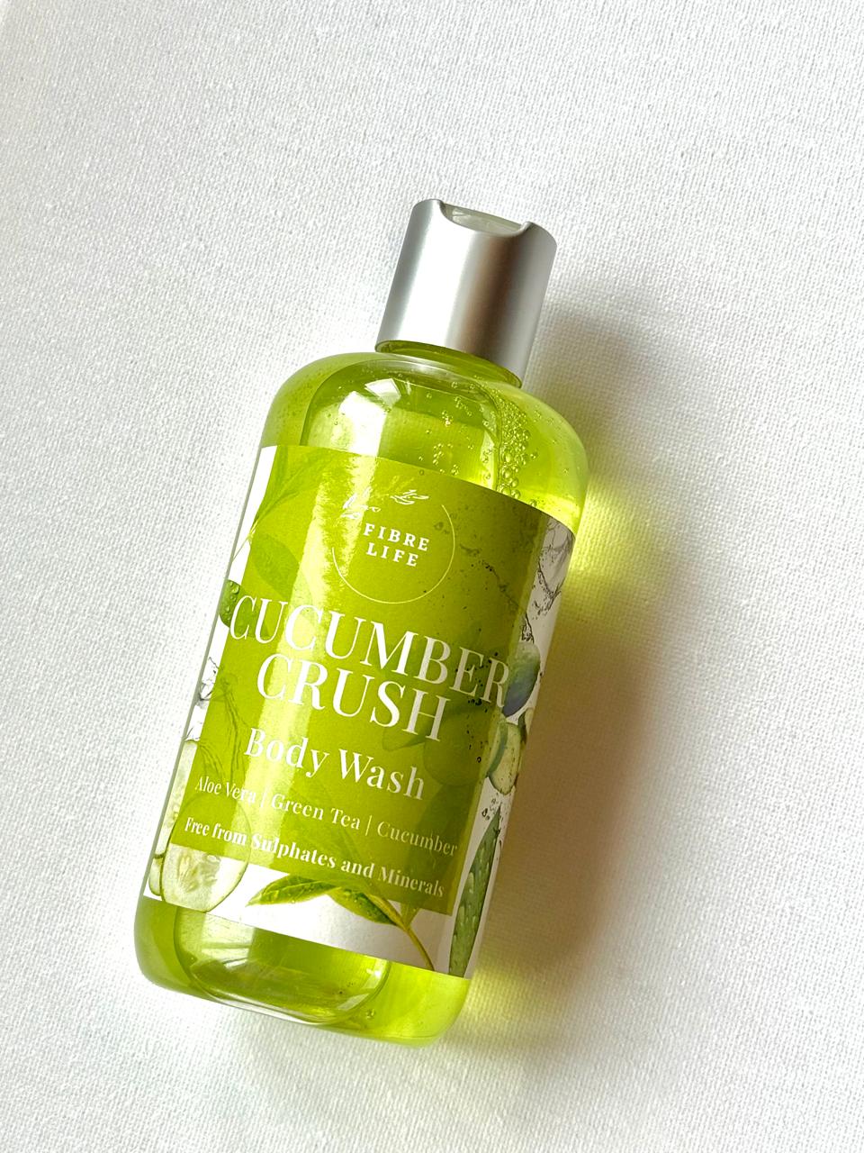 Bottle of aloe vera and cucumber body wash on a white background