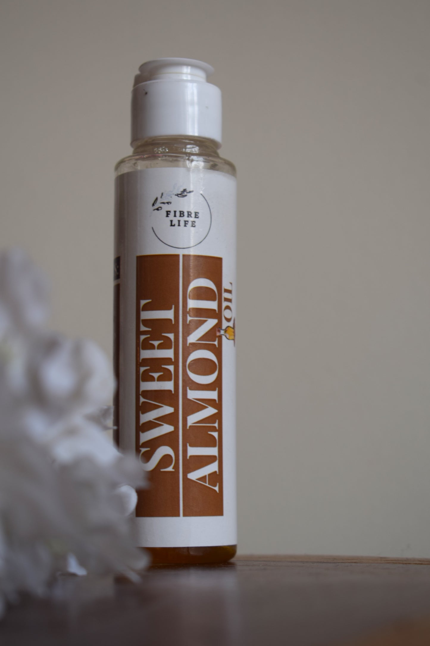 Pure sweet almond oil for massage, deep moisture, and natural radiance.