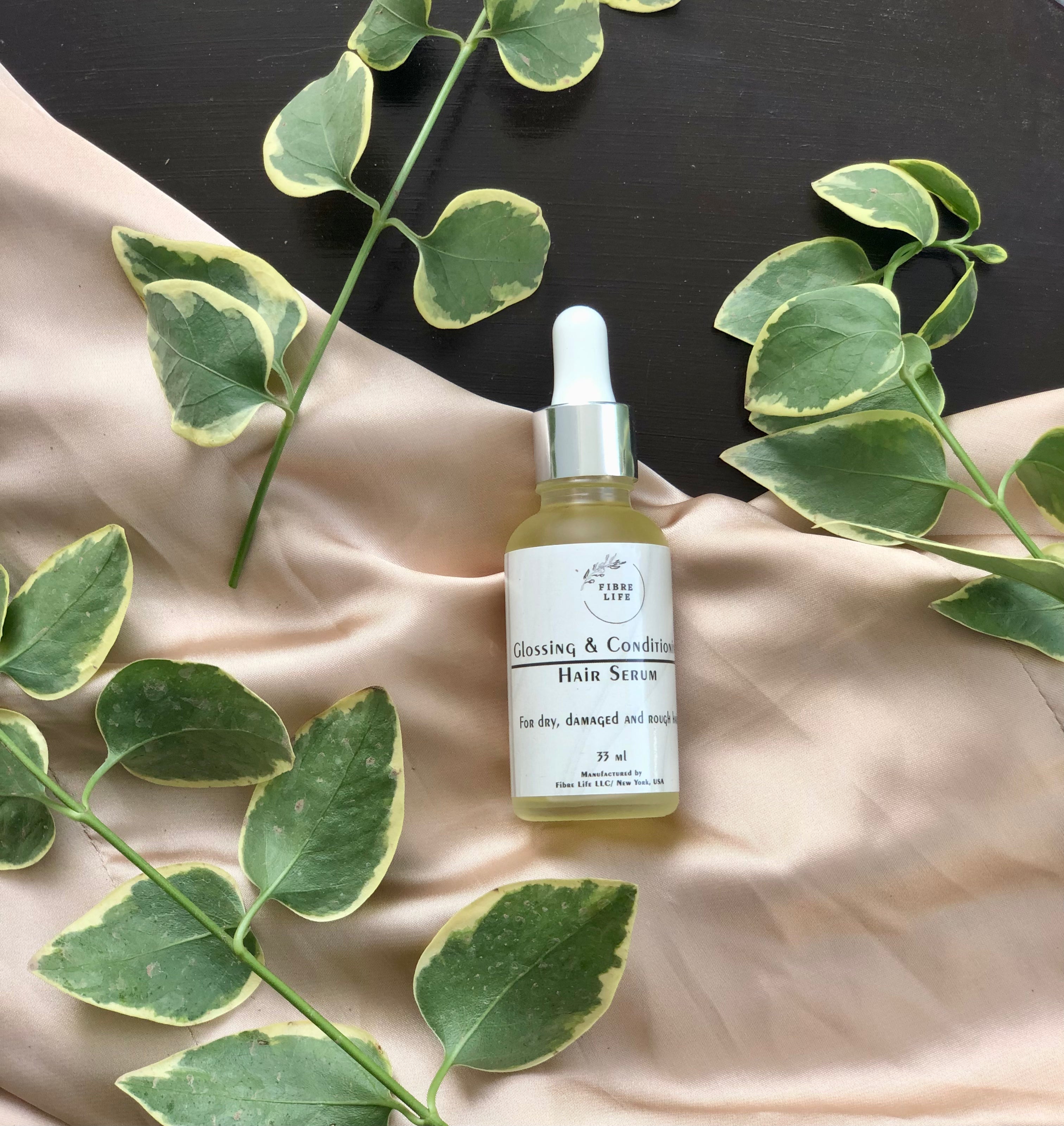 organic and effective hair and skin solutions pakistan. a bottle of anti frizz glossing serum that gives shine and volume to the hair without weighing it down 
