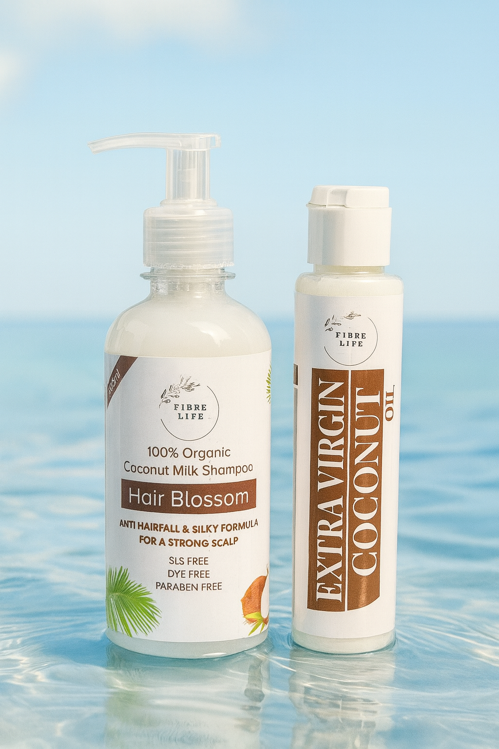 Two bottles of hair care products on a reflective surface with a blurred natural background