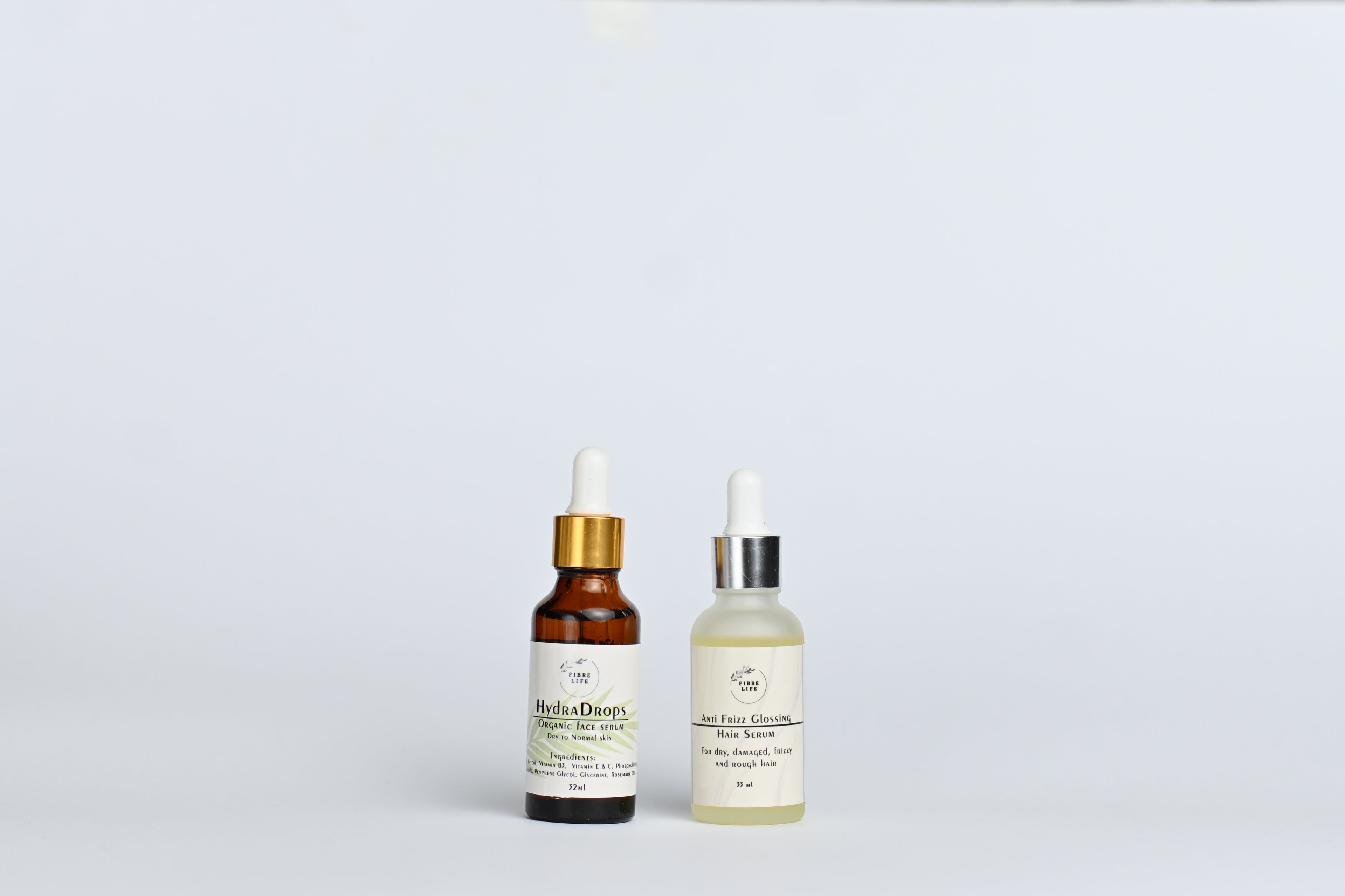 Hydrating face and hair serums infused with natural extracts to combat dryness and promote radiance.