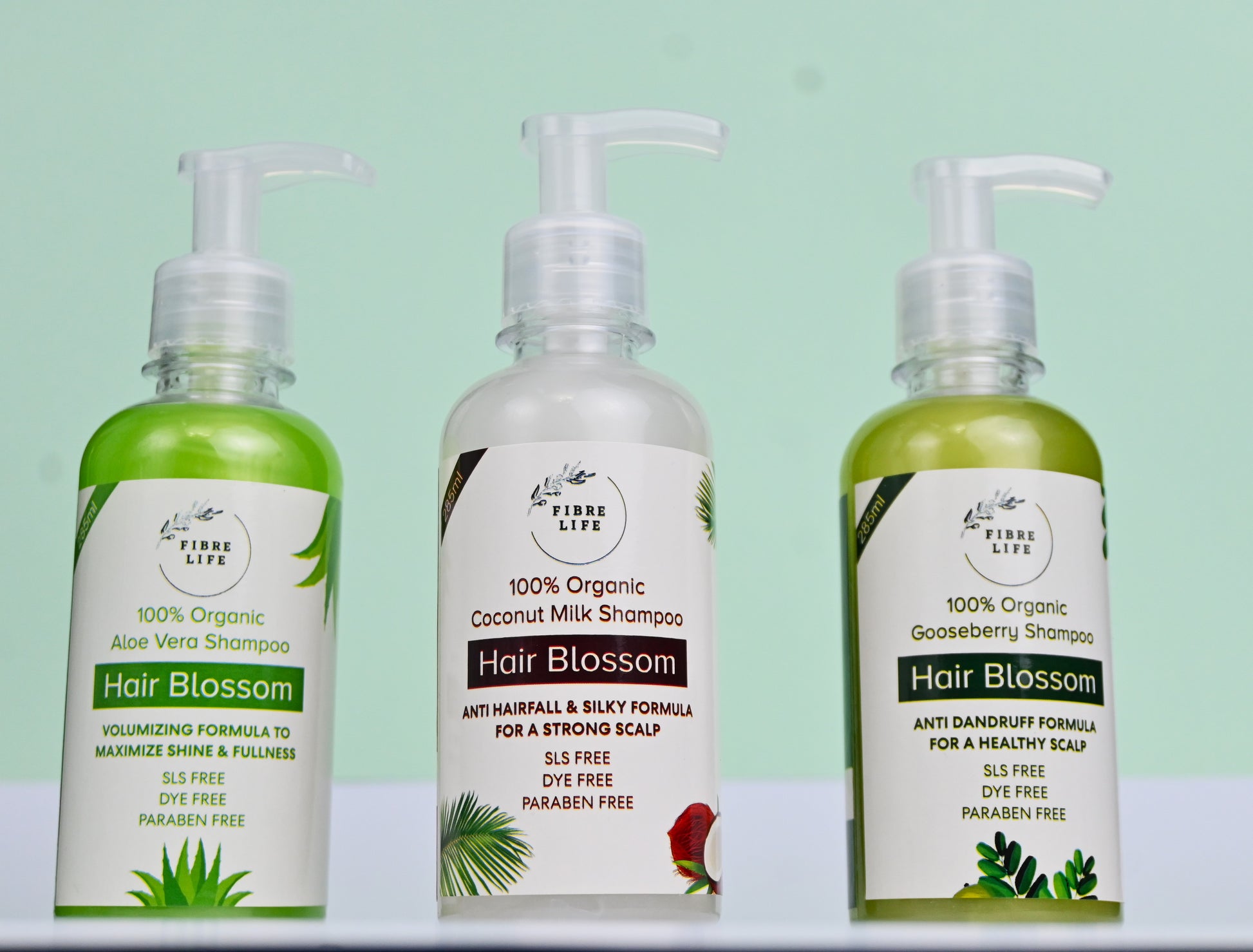 FibreLife Shampoo Trio with Coconut, Aloe Vera, and Gooseberry for healthy, strong hair.